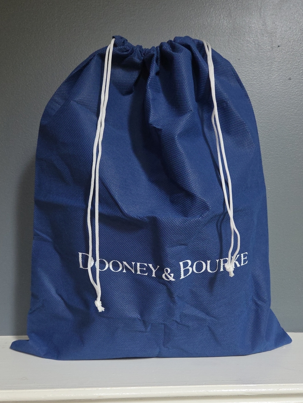 Dooney & Bourke Navy Drawstring Accessory Bag with White Cord- New Never Used